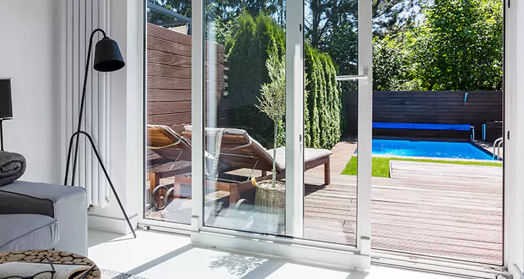 Fixing A Sliding Screen Door Roller in Tamiami, FL